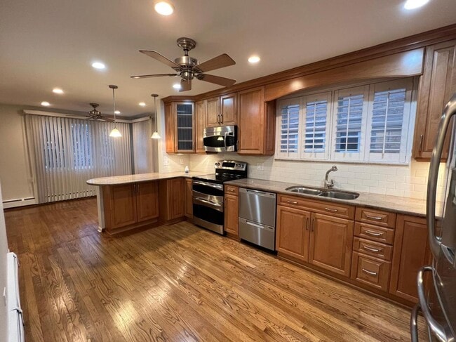 Photo - 9533 Schiller Blvd Unidad 1
