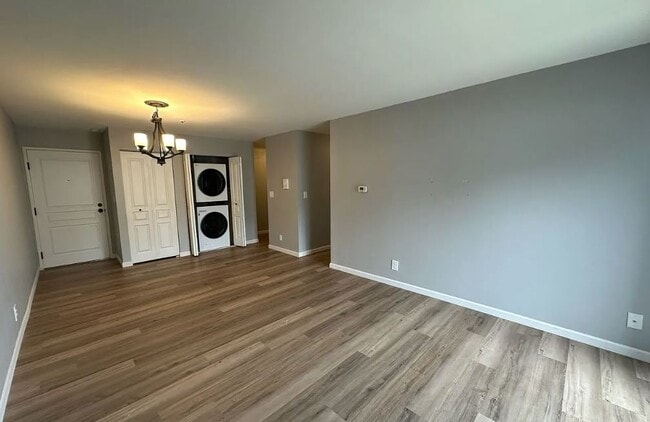 Living Area and in unit laundry - 12765 W Hampton Ave Unit #115