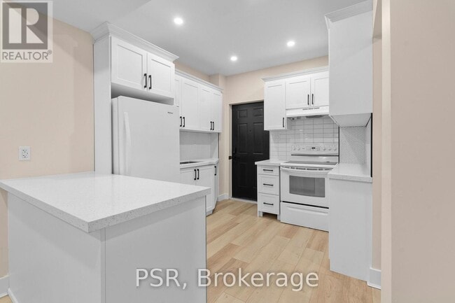 Photo - 200 Sanford Ave S Unité Main