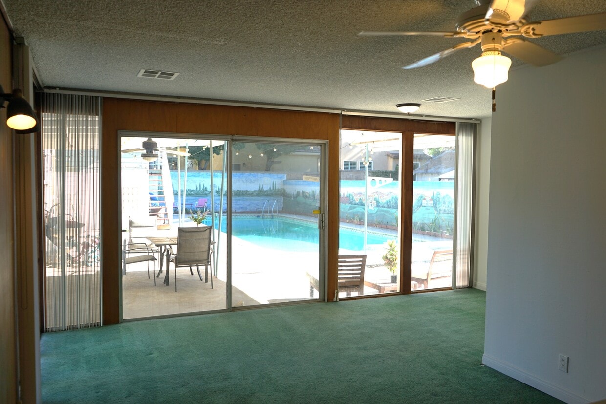 Family Room with Pool View - 120 E Fern Ave (Redlands, CA)