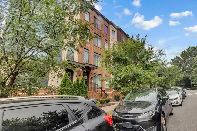 Photo - Modern 4-Level Townhome with Rooftop Terrace & Indoor/Outdoor Fireplace Near Old Town