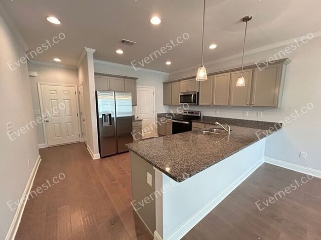 Photo - Spacious 3 Bed, 2.5 Bath Home with Modern Amenities / Available Soon!