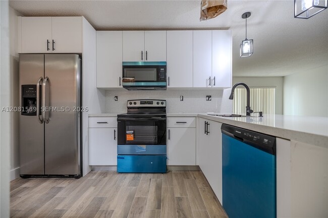 Building Photo - 12527 NW 11th Ln Unit 204