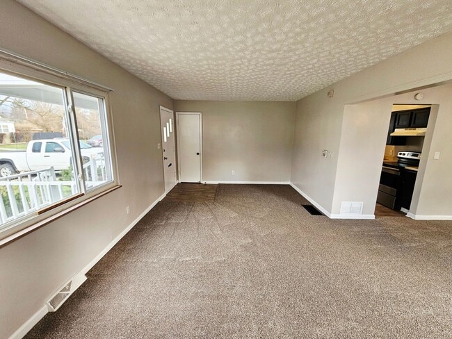 Photo - Move-In Ready 3BR/1BA Home w/ 2-Car Garage | Recently Updated