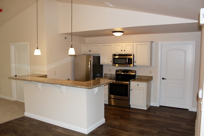 Modern Kitchen with Hardwood Floors and Granite Countertops - Fox River Preserve II