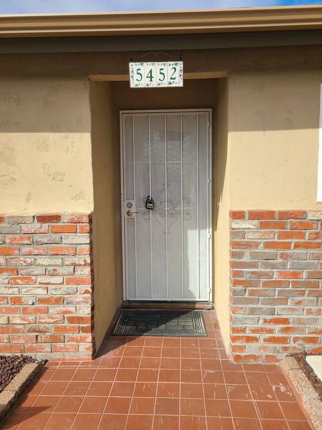 Photo - Spacious 4 bed 2 bath + 2 car garage & large backyard.