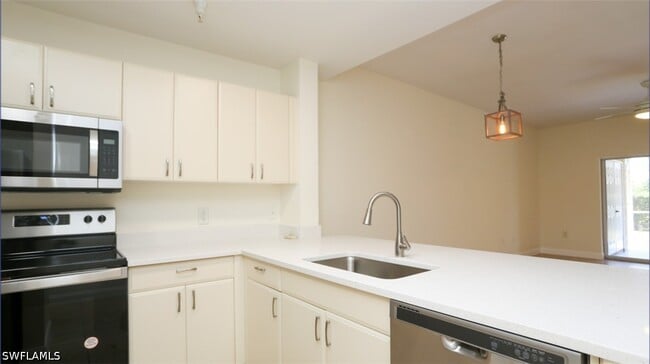 Building Photo - 4455 Botanical Pl Cir Unit 5-104