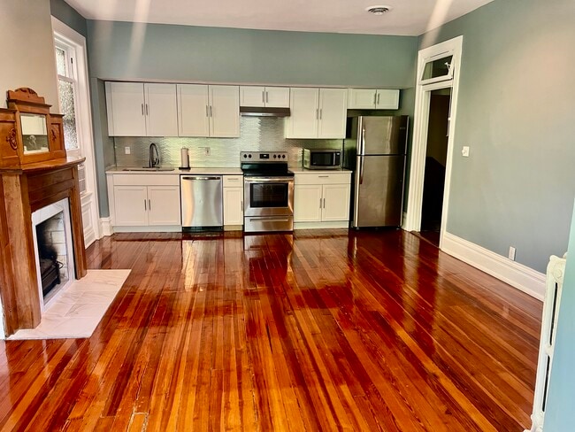 Building Photo - 4124 W Pine Blvd Unit 2FF