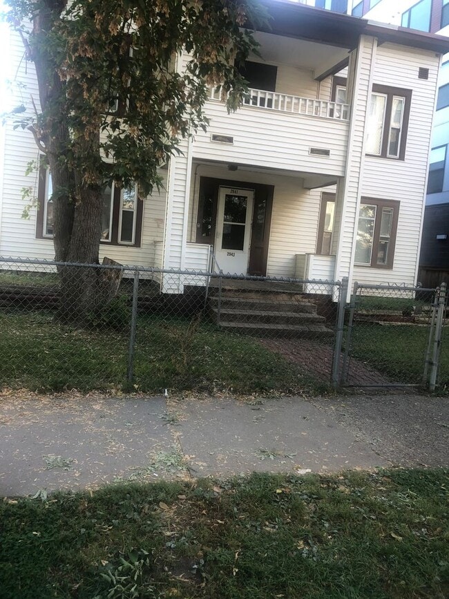 Building Photo - 2941 Harriet Ave Unit 4