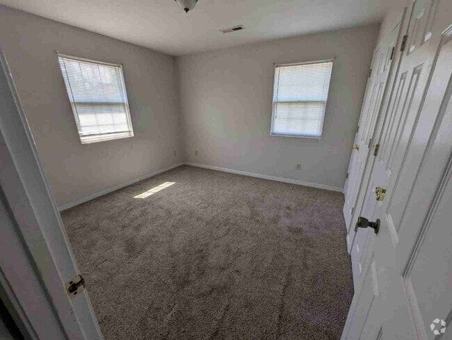 Building Photo - 5780 Metropolis Lake Rd Rental
