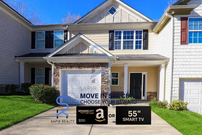 Building Photo - Move in before January 31st and choose your reward: a $250 Amazon Gift Card or a 55" Smart TV!