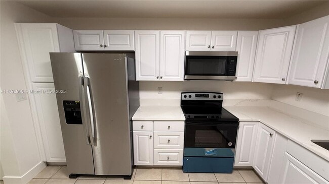 Photo - 6046 SW 40th St Unidad Rear
