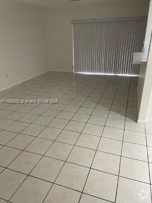 Building Photo - 9617 SW 138th Ave Unit TC1L Rental
