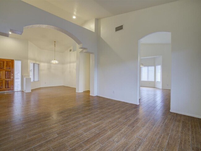 Photo - Spacious 4-Bedroom Home with Open Layout & Large Backyard