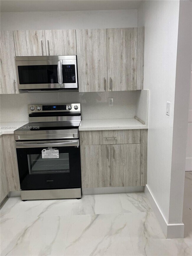 6190 W 19th Ave Unit 206