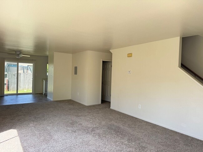 Photo - Charming 3 bedroom 1.5 bathroom Two story Town House with an attached garage.