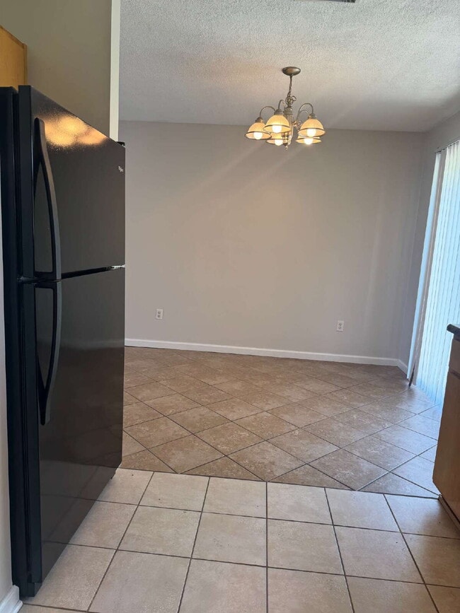 Photo - "Coastal Comfort Awaits: Charming 2-Bed, 2-Bath Townhouse on Catherine Street!" Unit A