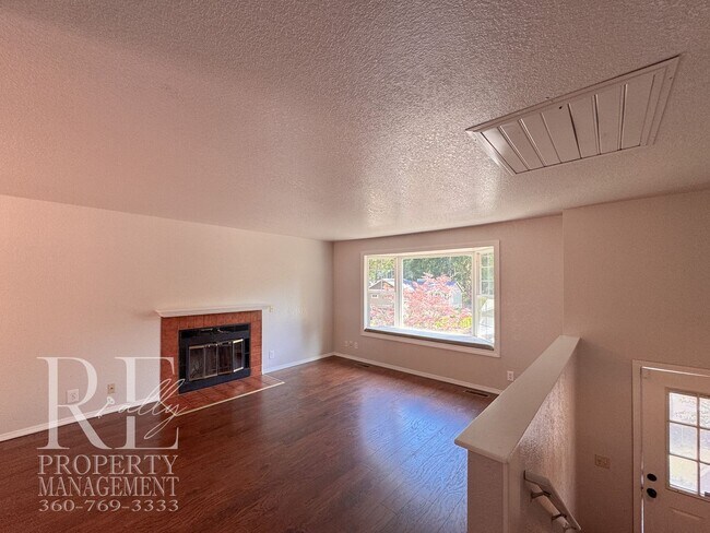 Photo - Freshly Painted East Bremerton Home with Expansive Decks & Flexible Living Space