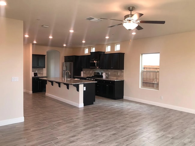 Photo - Beautiful Two-Story Home Featuring Granite Kitchen, Large Island & Spa-Style Primary Suite