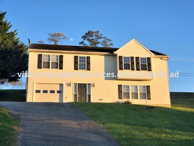 Building Photo - Charming Raised Rancher With Lawn Care Included