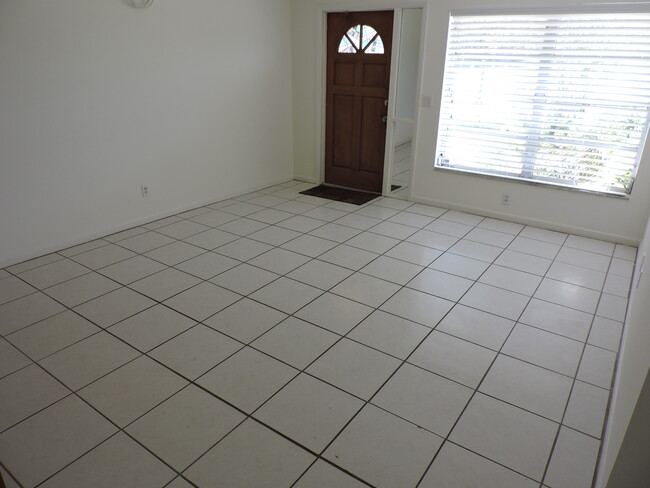 living room with tiled flooring