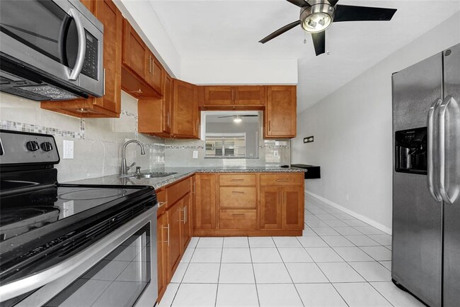 Building Photo - 7401 Pines Blvd Unit 210 Rental