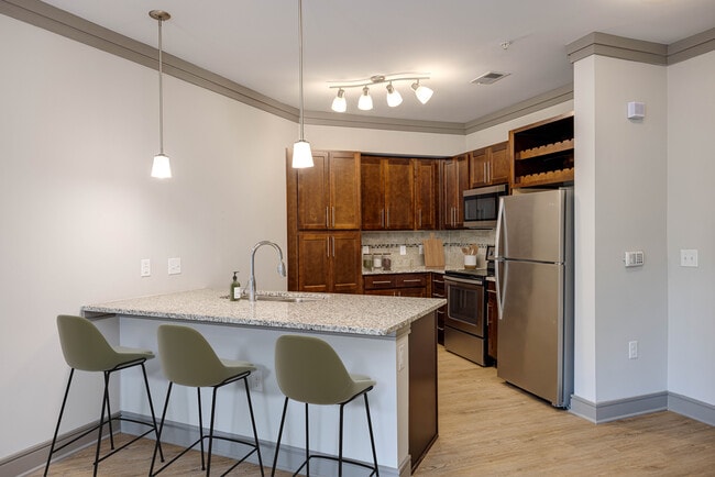 Modern kitchens with built-in wine rack - Avalon Perimeter Park