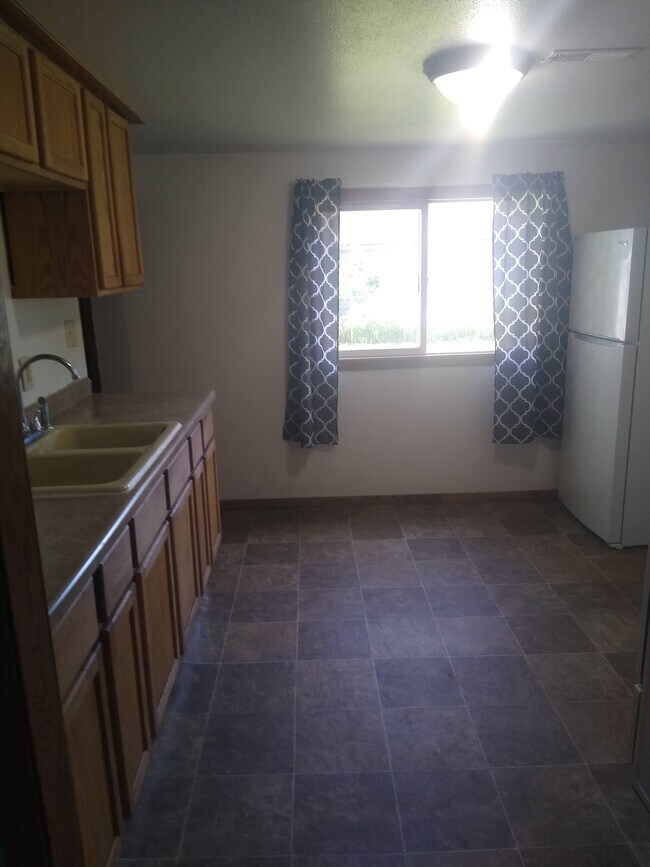 View of kitchen from diningroom - 101 W 3rd St