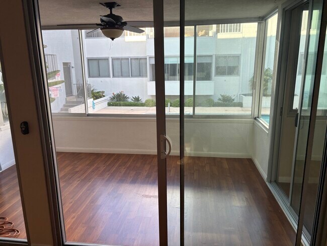 Sunroom/view to courtyard - 8701 Delgany Ave Unit 111