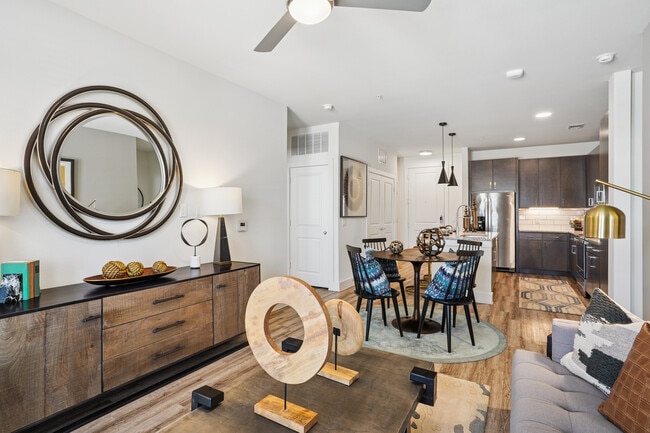 Kitchen, living, and dining area with hard surface flooring