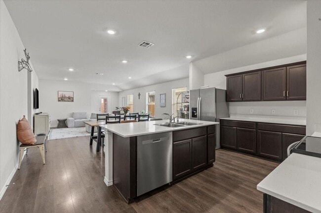 Photo - Modern single-story home with 4 bedrooms, 2 bathrooms, open-concept living, stylish kitchen, two-...