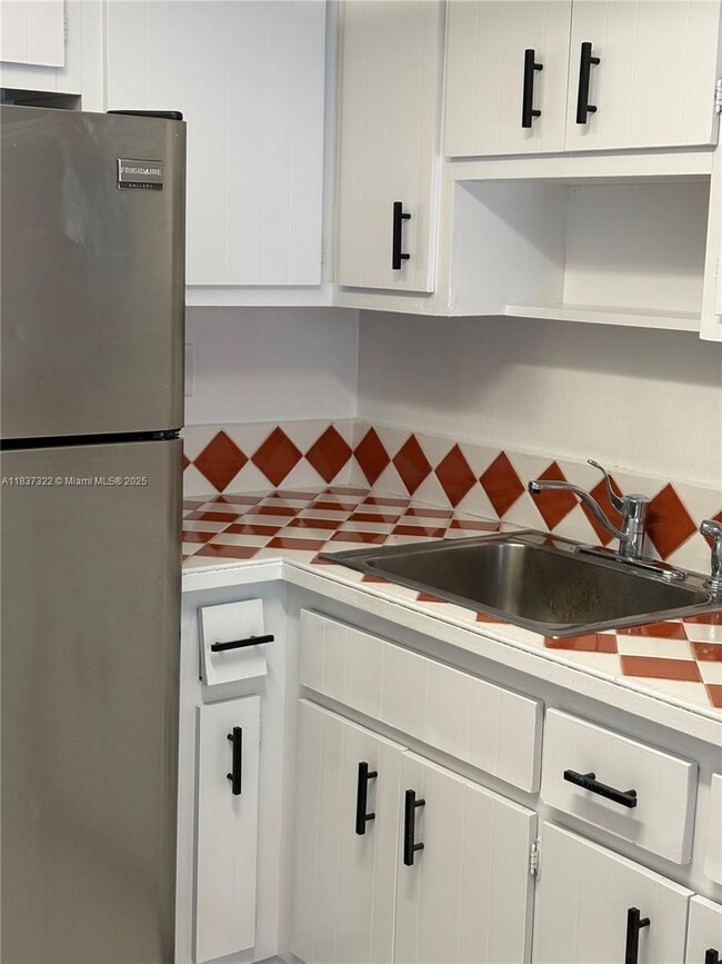 Building Photo - 1470 NE 125th Terrace Unit 205 Rental