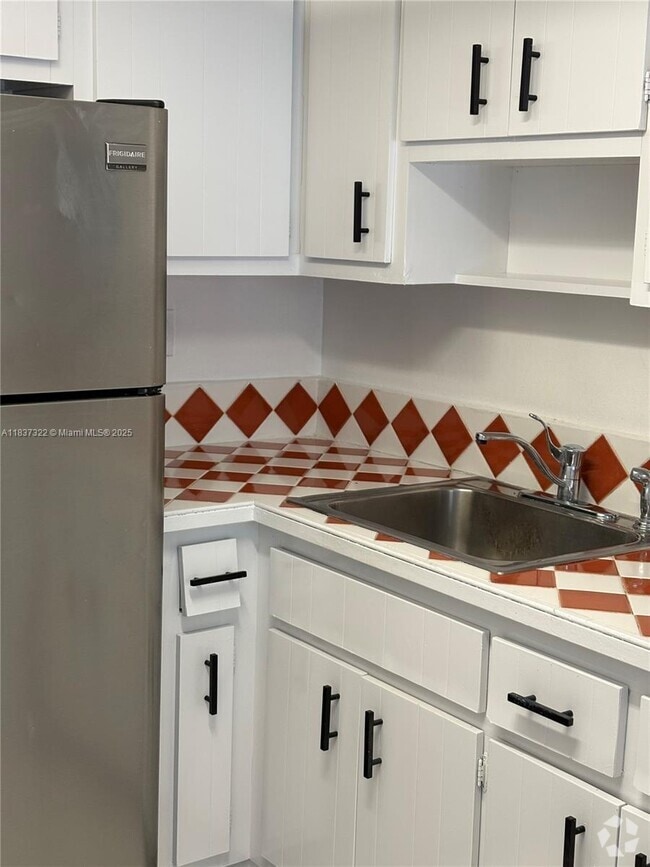 Building Photo - 1470 NE 125th Terrace Unit 205 Rental