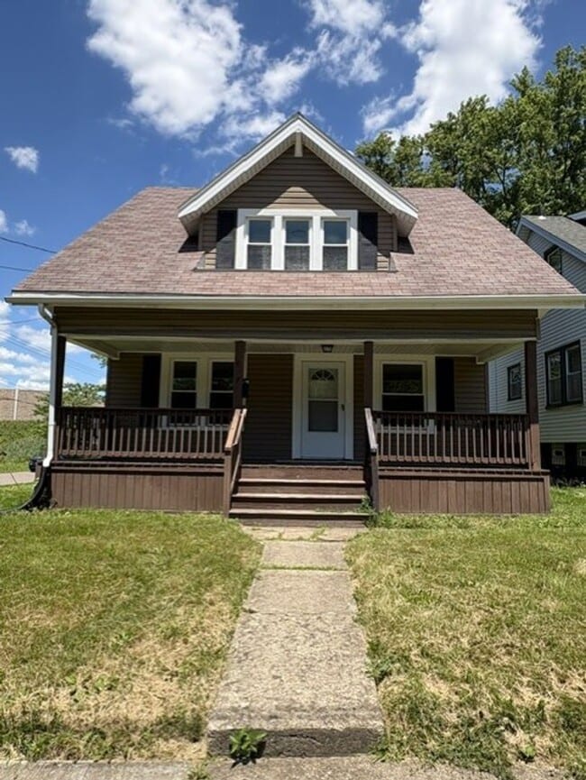 Building Photo - Comfortable Akron Home with Covered Front Porch, Dining Room & 2-Car Garage