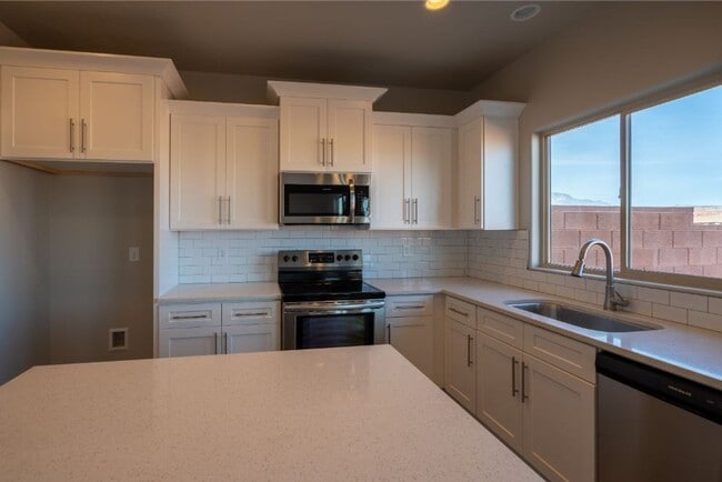 Photo - Amazing views! Like New 3 bedroom, 2.5 bath townhome, 2 car garage