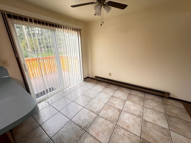 Photo - 13315-13317 E 26th Ave