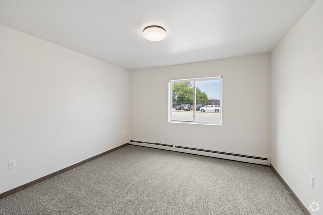 3BR, 2BA - 1,185SF - Primary Bedroom - Almond Apartments