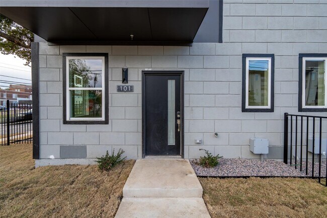Modern 4-Level Corner Condo with Rooftop Deck & Downtown Views – 2BR/2.5BA + Flex Spaces, 2-Car G...