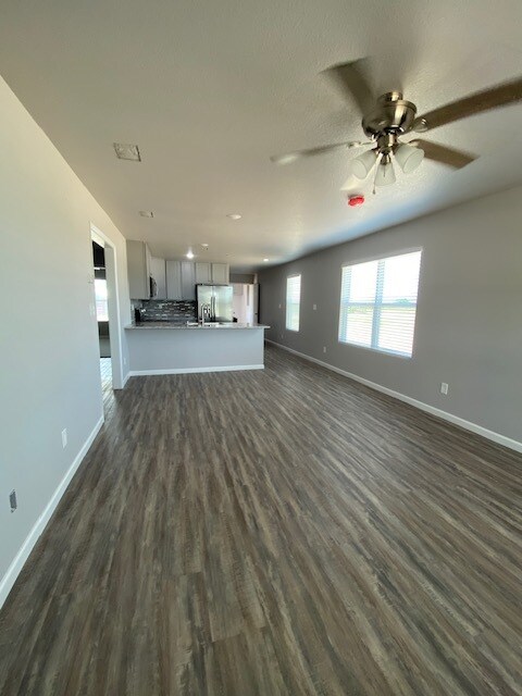 Open floorplan living/dining area with seating at kitchen bar also - 3876 County Road 123 Unit B or C