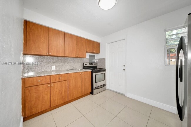 Building Photo - 5545 NW 3rd Ave Unit W