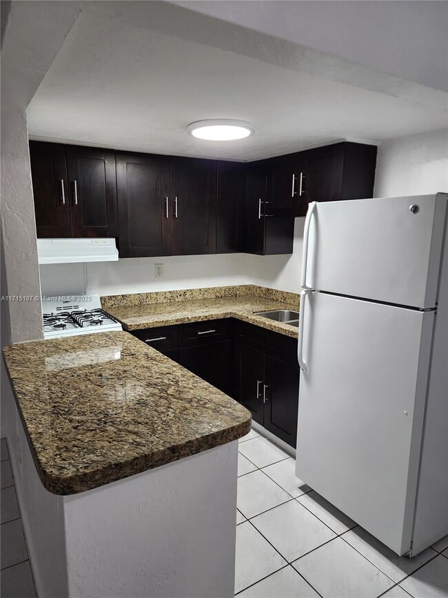 Photo - 1230 W 54th St Apartment Unit 102A