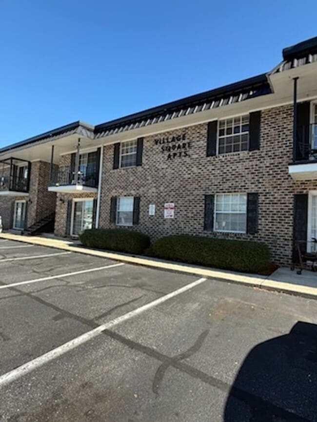 Building Photo - Village Square Apartments Unit 318B