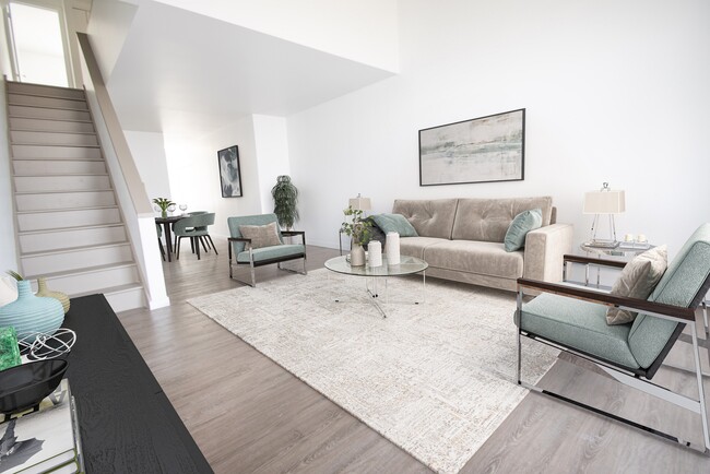 Taft&#39;s Airy Elegance: Lofty Living Room Retreat - The Taft Apartments