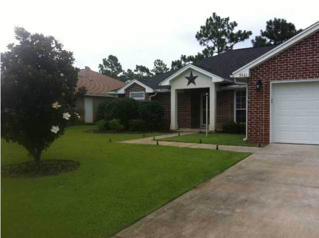 Building Photo - "Charming 4-Bed home in Navarre!"
