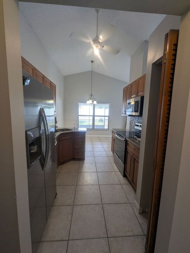 Photo - Whisper Lakes 3 Bedroom 2 Bath Home with Granite Counter Tops, Stainless Appliances and a Fenced ...