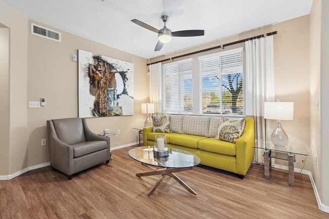 Welcome to Highland Groves at Morrison Ranch, where contemporary design meets comfort. Enjoy a stylish living space with large windows that flood the room with natural light and modern furnishings. Elevate your lifestyle—schedule a tour today!
