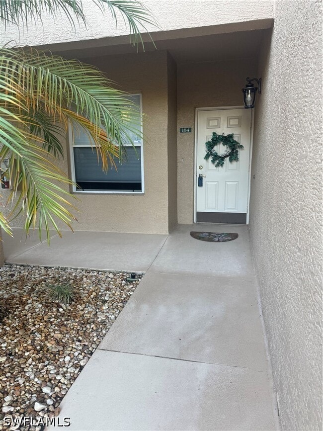 Building Photo - 6670 Huntington Lakes Cir Unit 104