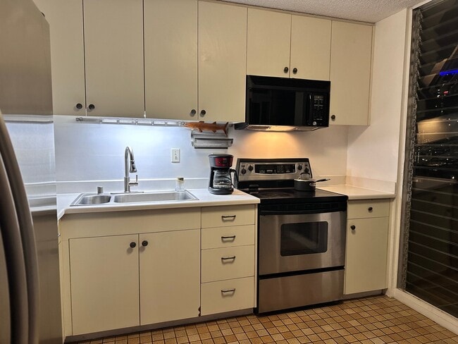 Photo - 1650 Kanunu St Unit PH3