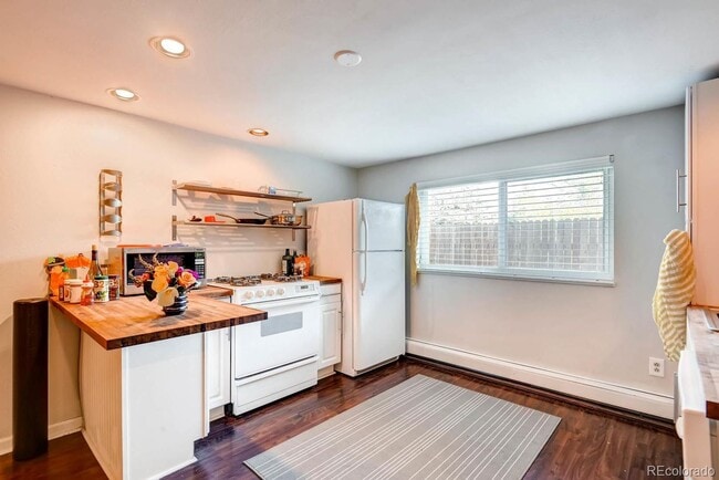 Building Photo - Must see studio near Sloans Lake! Rental