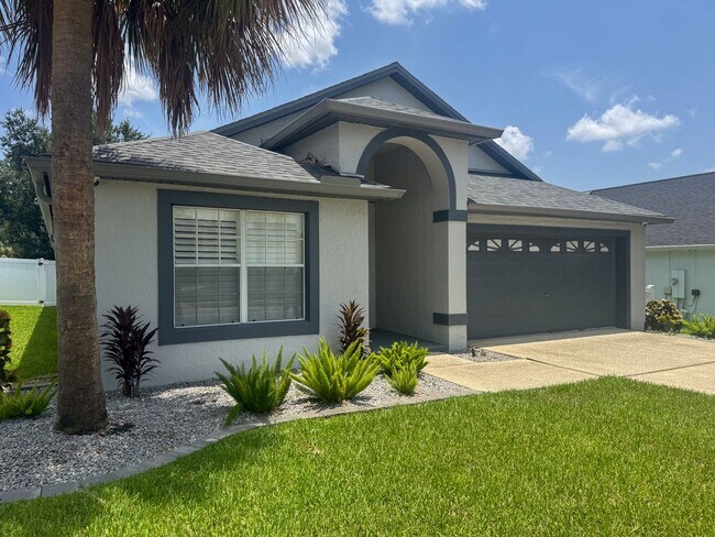 Photo - Beautifully updated and modern 5 bedroom 4 bathroom pool home located in the Orange Tree